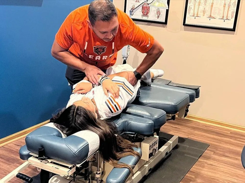 Dr. Rodrigo Juarez adjusting a patient at Juarez Chiropractic